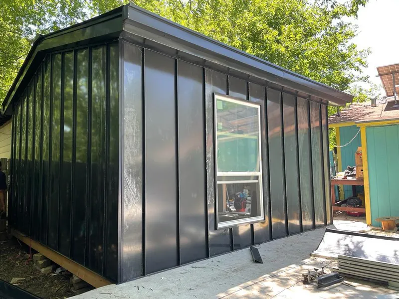 Black standing seam metal wall panels for Metal Roof Installation in Fort Bragg