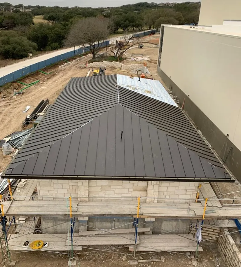 Metal roof new construction with scaffolding in Fort Bragg